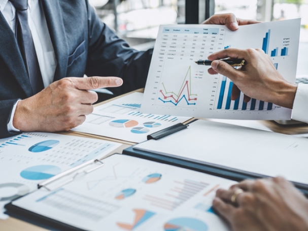 Two executive discussing company growth project success financial statistics, Partner meeting professional investor working start up project for both company with document, laptop and digital tablet.
