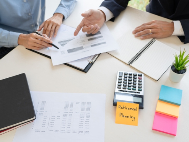 wealth management concept, business man and team analyzing financial statement for planning financial customer case in office