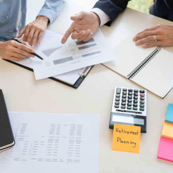 wealth management concept, business man and team analyzing financial statement for planning financial customer case in office